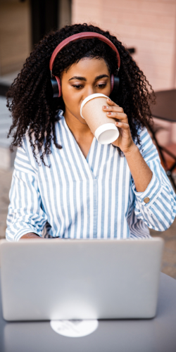 Woman drinking coffee and feeling happy